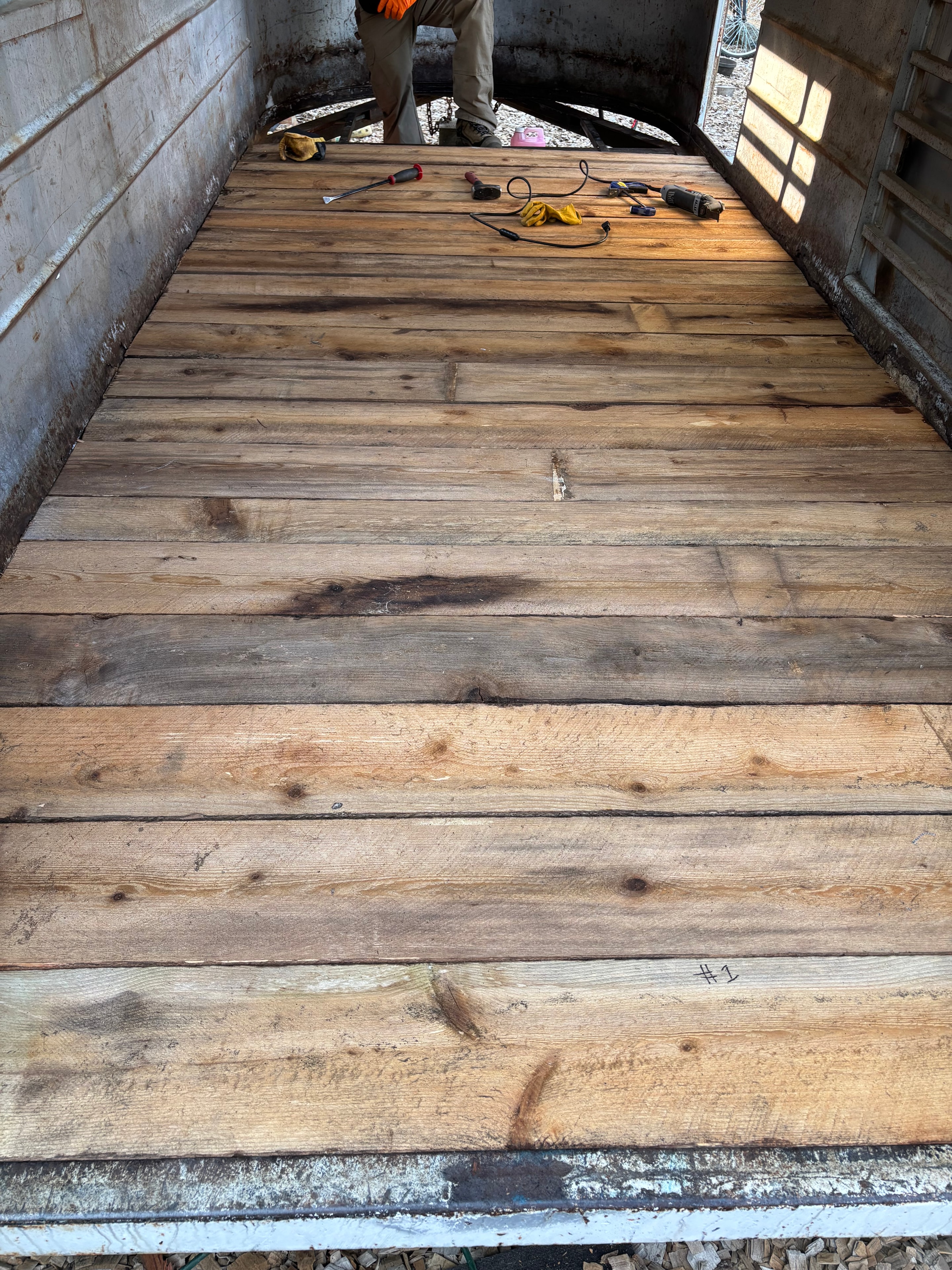 Before — rotting wood in stock trailer