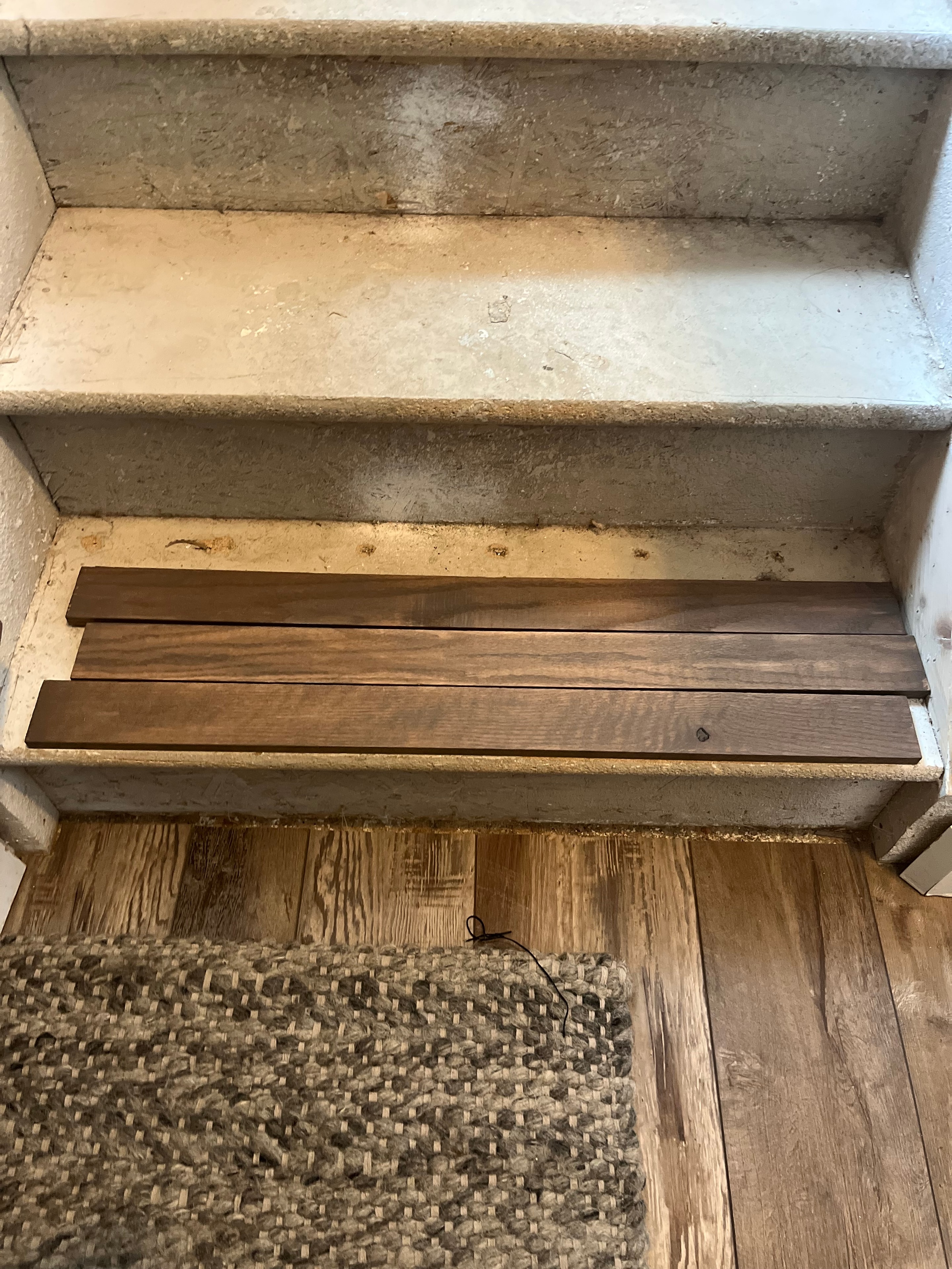 Before — worn concrete stair treads